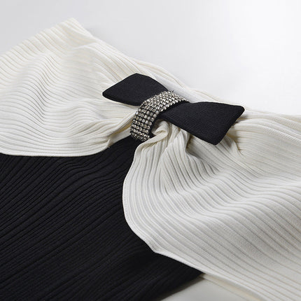 Black off-shoulder bodycon dress with bow detail