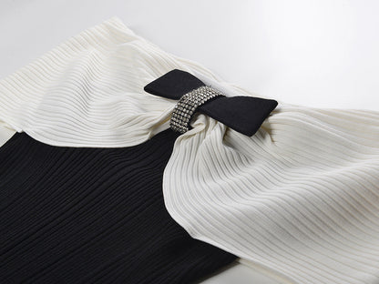 Black off-shoulder bodycon dress with bow detail