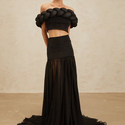 Black off the shoulder cropped top with braid detailing and rhinestone embellishment
