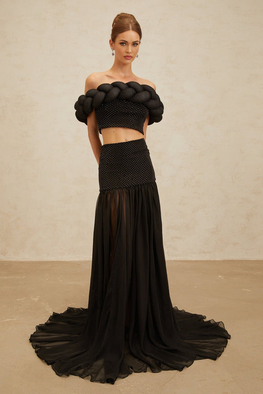 Black off the shoulder cropped top with braid detailing and rhinestone embellishment