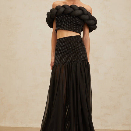 Black off the shoulder cropped top with braid detailing and rhinestone embellishment