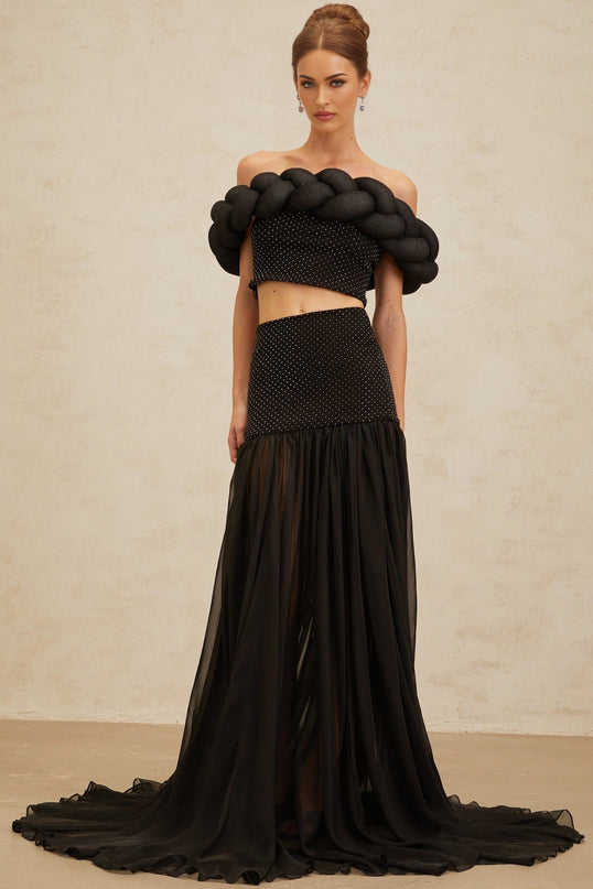 Black off the shoulder cropped top with braid detailing and rhinestone embellishment