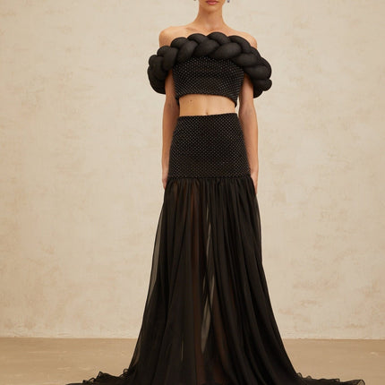 Black off the shoulder cropped top with braid detailing and rhinestone embellishment