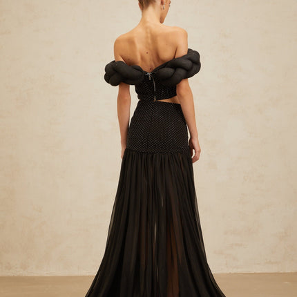 Black off the shoulder cropped top with braid detailing and rhinestone embellishment