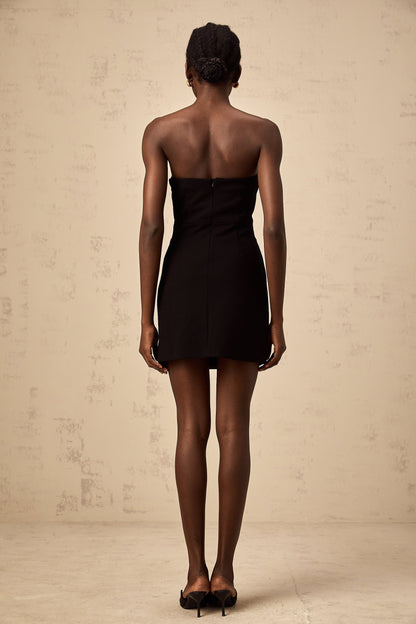 Black off shoulder mini dress with feather embellishments