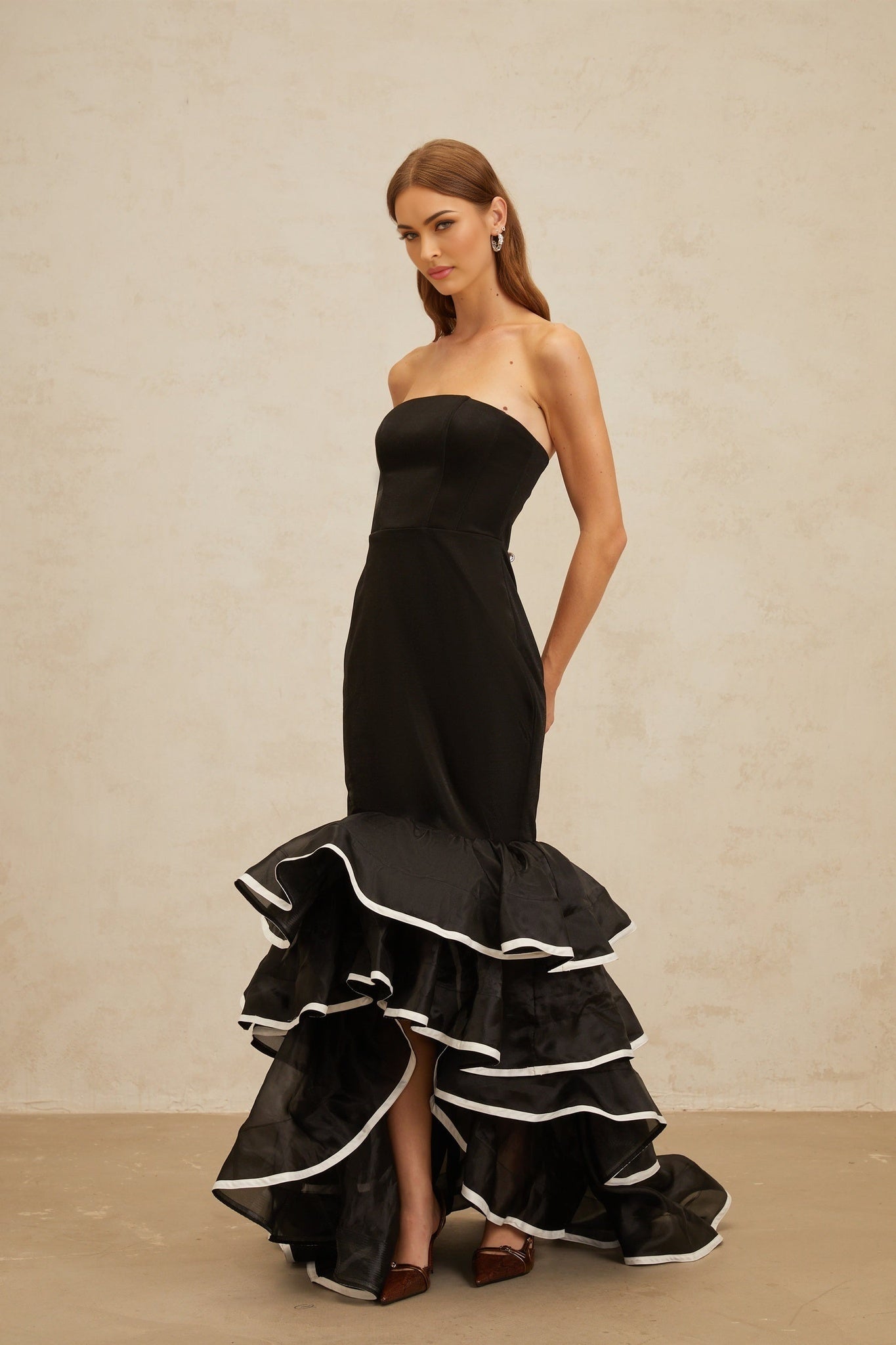 Black off the shoulder sleeveless maxi dress with ruffled detailing and mermaid hem