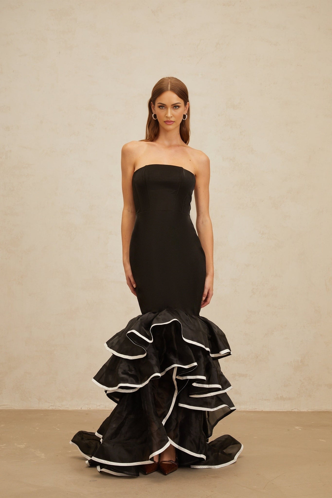 Black off the shoulder sleeveless maxi dress with ruffled detailing and mermaid hem