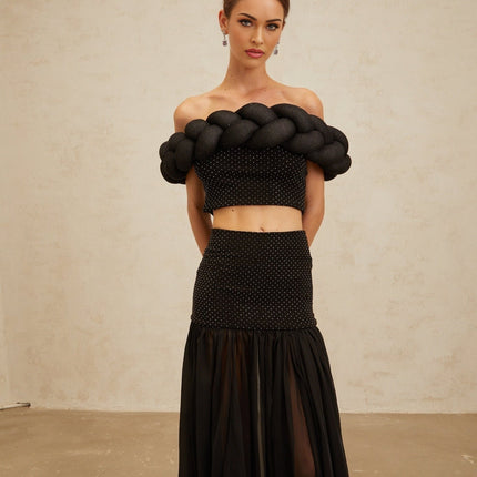 Black off the shoulder cropped top with braid detailing and rhinestone embellishment