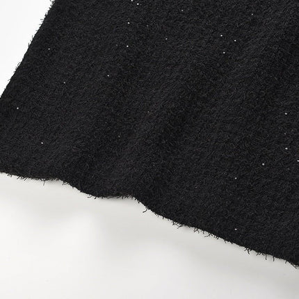 Black Peplum Top and Fitted Skirt Ensemble with Decorative Buttons and Pockets