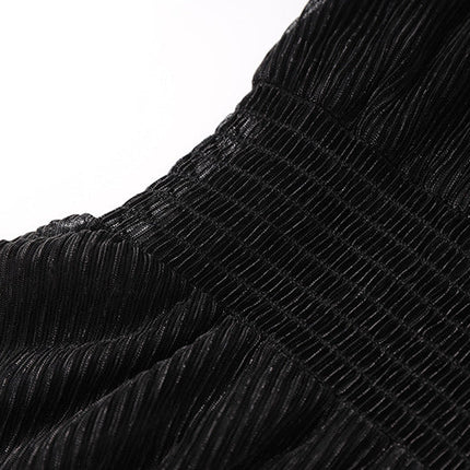 Black pleated maxi dress with V-neckline and sheer sleeves and waistband