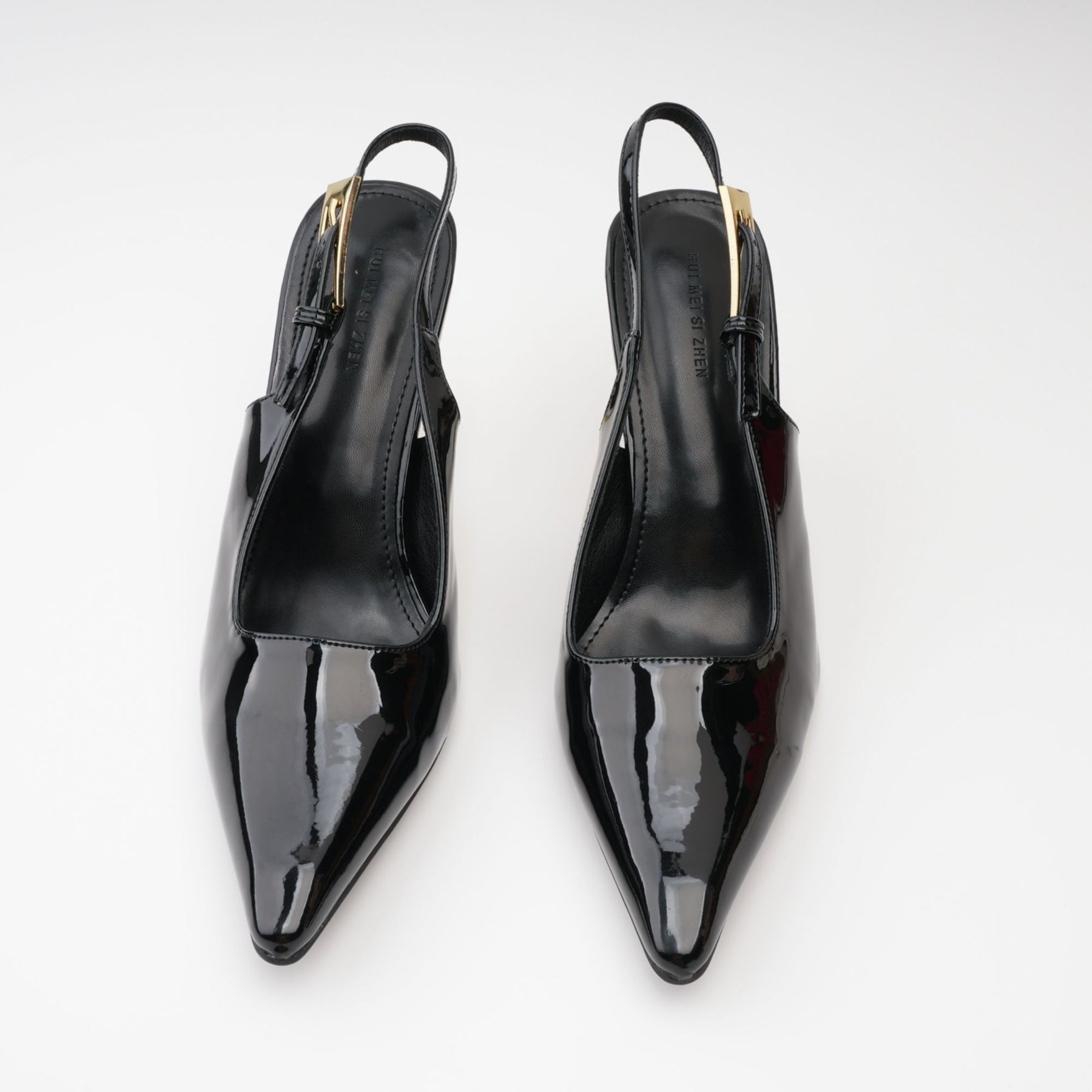 Jet black dress with luxurious leather insole glossy patent finish and elegant slingback straps