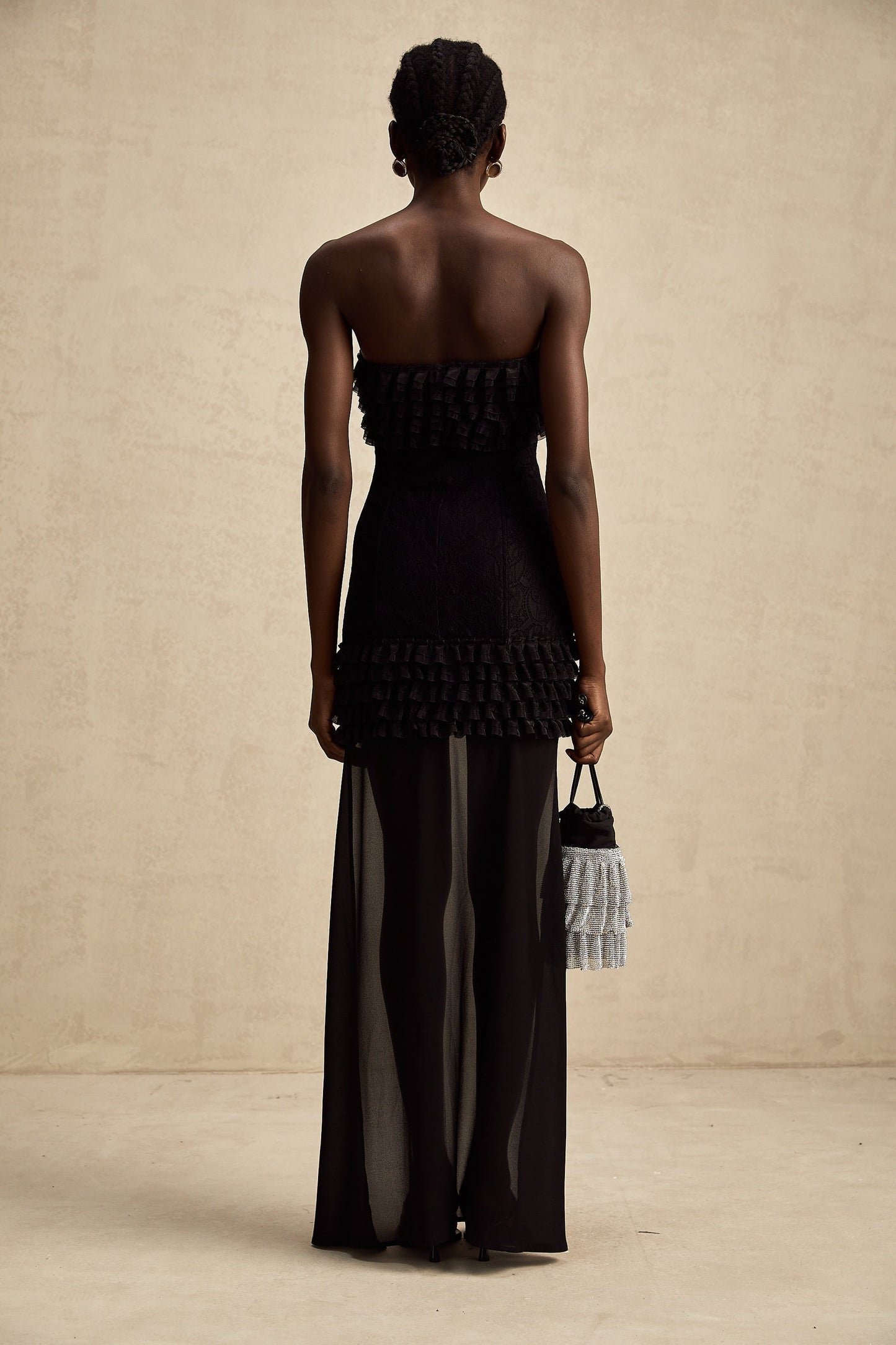 Black ruched mini dress with train by Michele