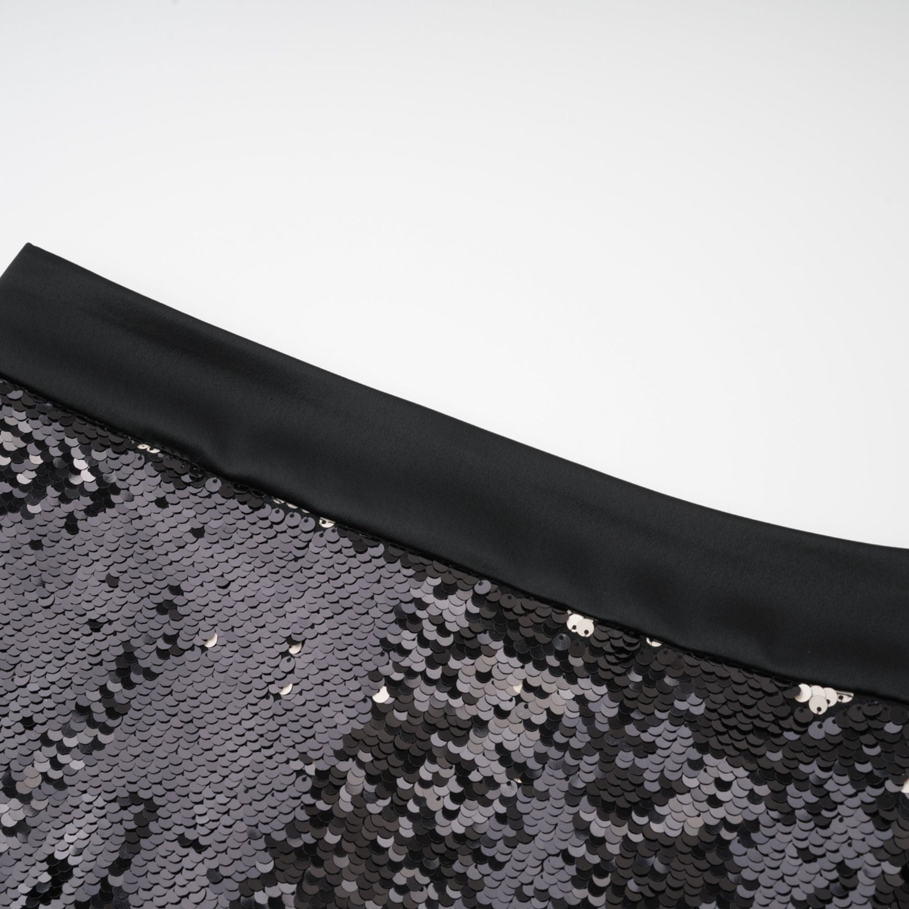 LBD with sparkling finish sequin decoration and thighlength straight hem rear zip closure 100% Polyester