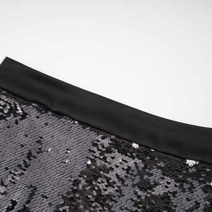 LBD with sparkling finish sequin decoration and thighlength straight hem rear zip closure 100% Polyester