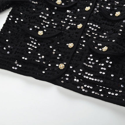 Black sequined cropped jacket with bejeweled buttons