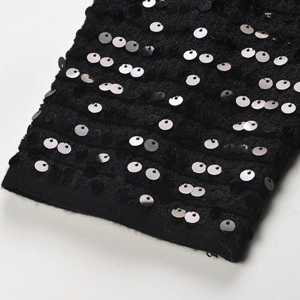 Black sequined cropped jacket with bejeweled buttons