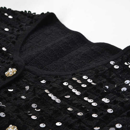 Black sequined cropped jacket with bejeweled buttons