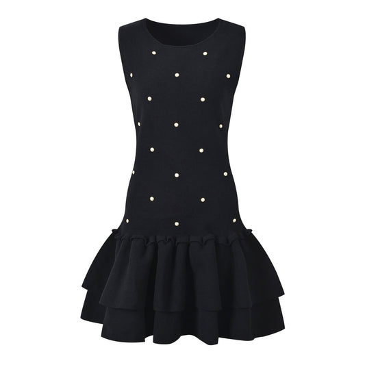Black sleeveless dress with pearl embellishments and ruffle hem