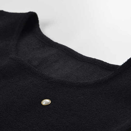 Black sleeveless ruffle hem dress with pearl embellishments