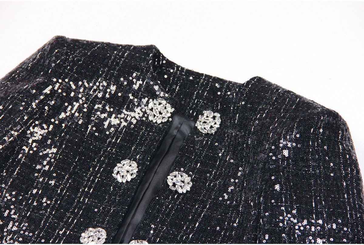 Black structured tailored tweed jacket with silver detailing and jeweled buttons