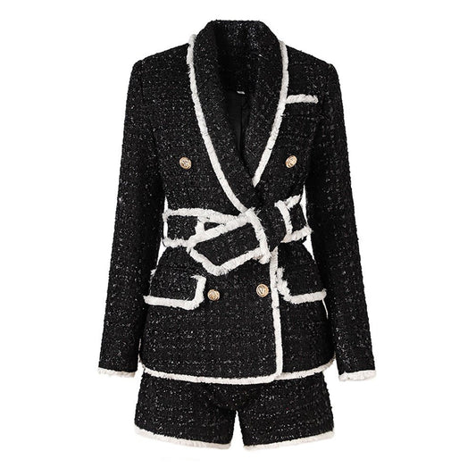 Black tailored blazer with shorts double-breasted belted waist white accents structured fitted silhouette tweed fabric gold-tone buttons trim chic sophisticated look modern twist classic styles semi-formal events spring fall