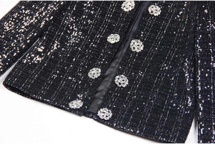 Black tweed structured blazer with silver detailing and jeweled buttons