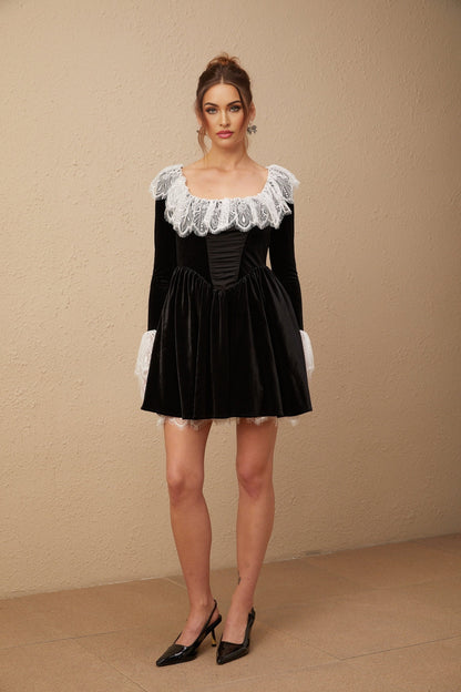 Black velvet mini dress with lace trim detailing named Fabiana