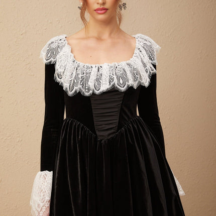 Black velvet mini dress with lace trim details named Fabiana