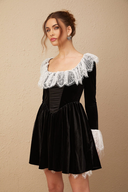 Black velvet mini dress with lace trim details