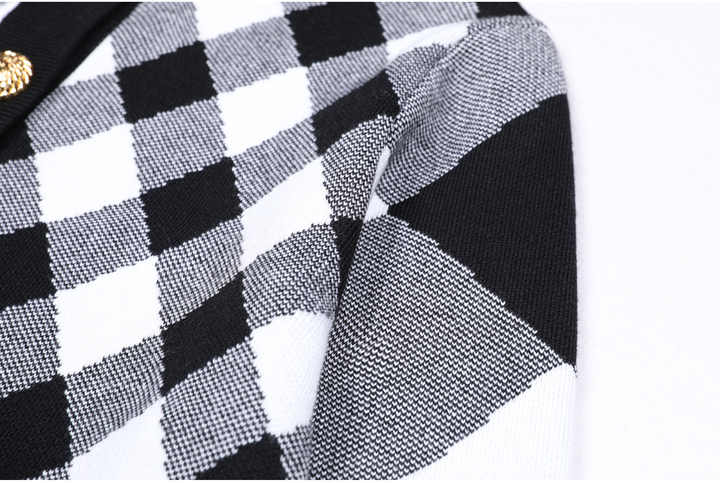 Black and white argyle pattern cropped knit cardigan with golden buttons