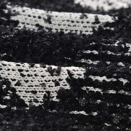 Black and white argyle knit cropped cardigan with gold-tone buttons