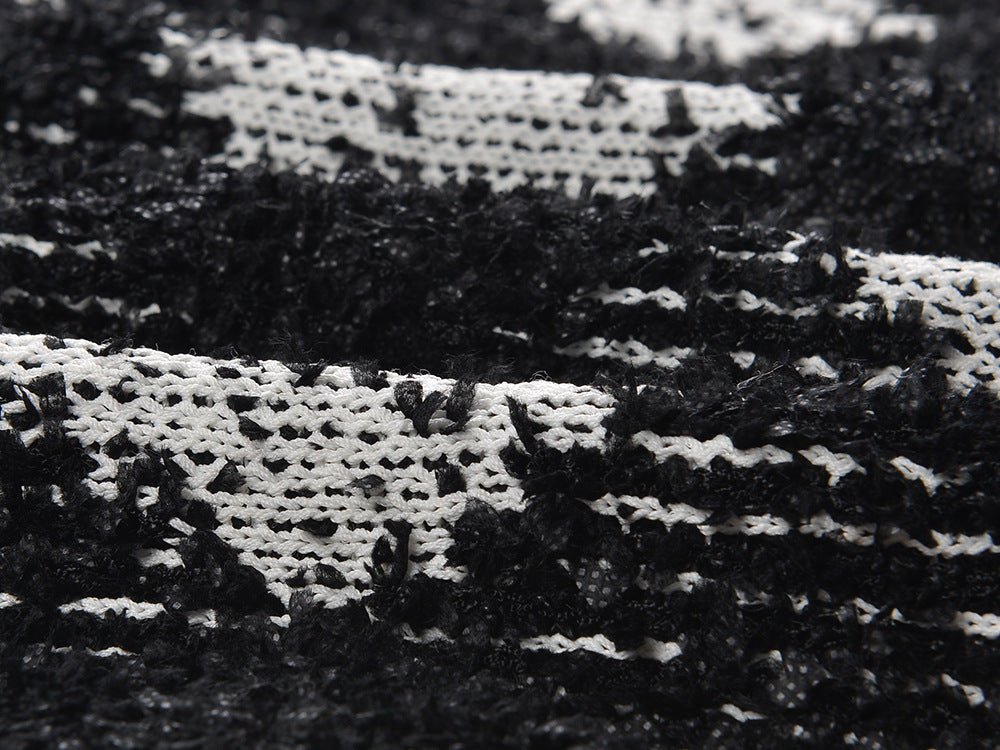 Black and white argyle knit cropped cardigan with gold-tone buttons