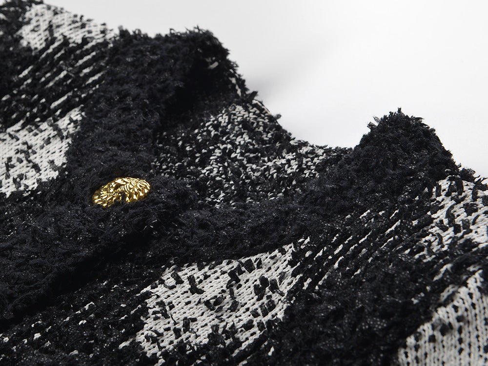 Black and white argyle knit cropped jacket with gold-tone buttons
