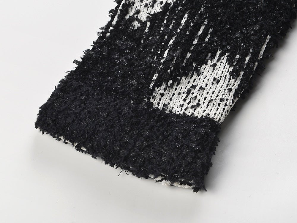 Black and white argyle knit cropped sweater with gold-tone buttons