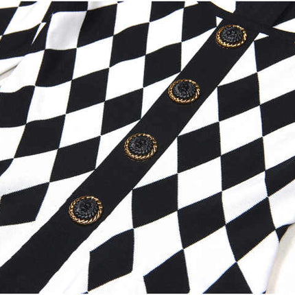 Black and white geometric harlequin pattern fitted dress with gold decorative buttons