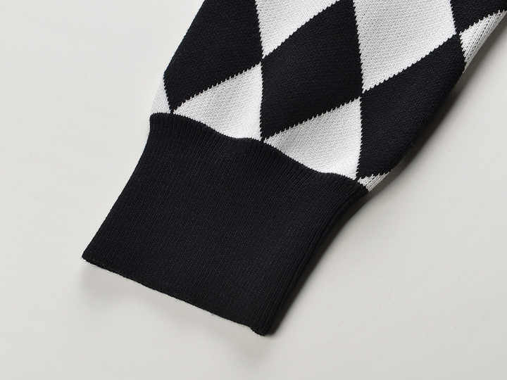 Black and White Harlequin Pattern Cardigan with Gold Button Accents and Pockets