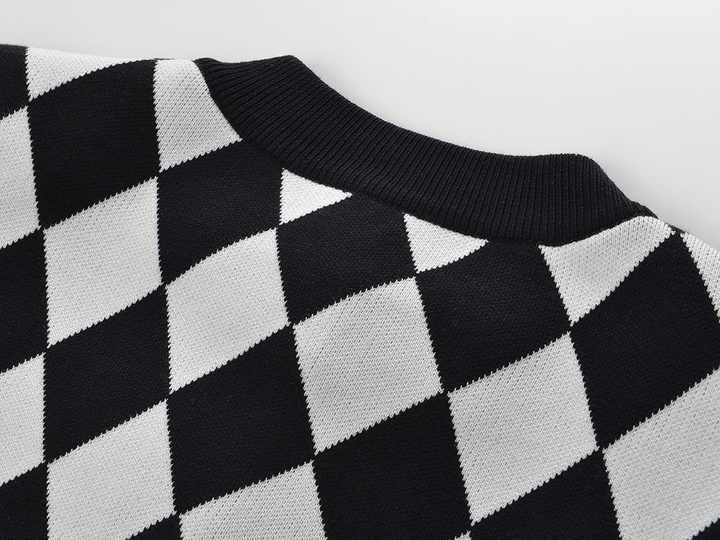 Black and White Harlequin Pattern Cardigan with Gold Button Accents and Pockets