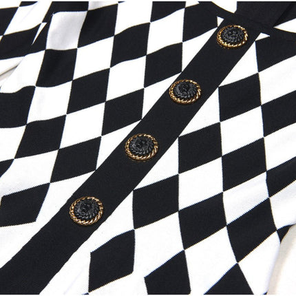 Black and white harlequin pattern fitted dress with gold decorative buttons