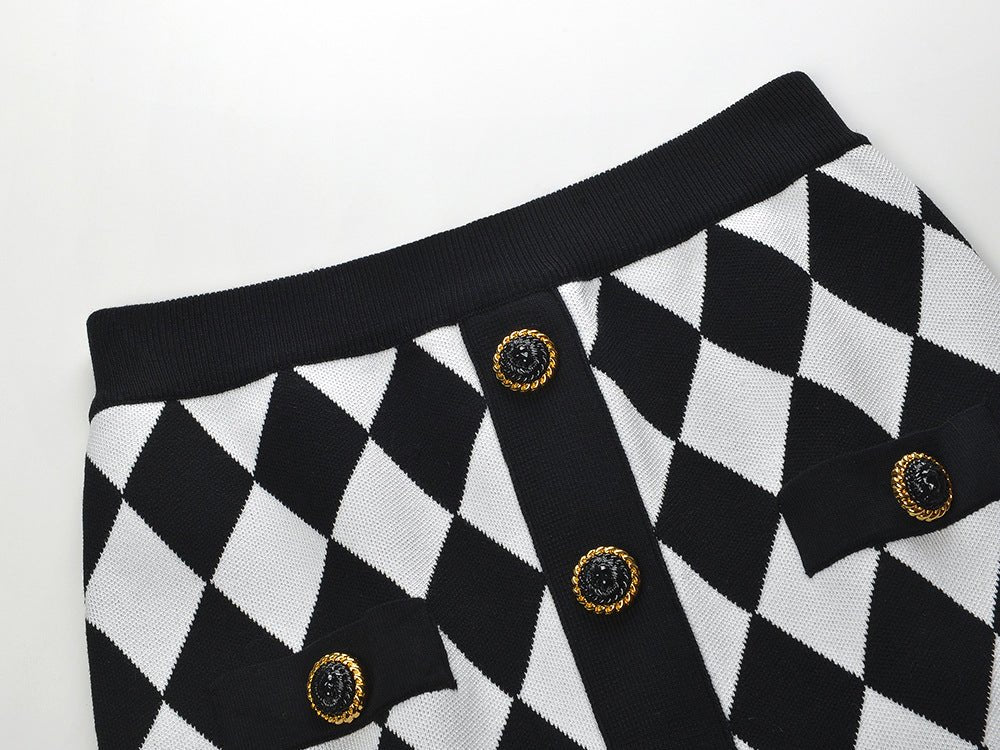Black and white harlequin pattern pencil skirt with gold-button accents