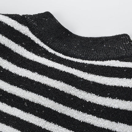Black and white striped fitted knit cardigan with gold-tone buttons and front pockets