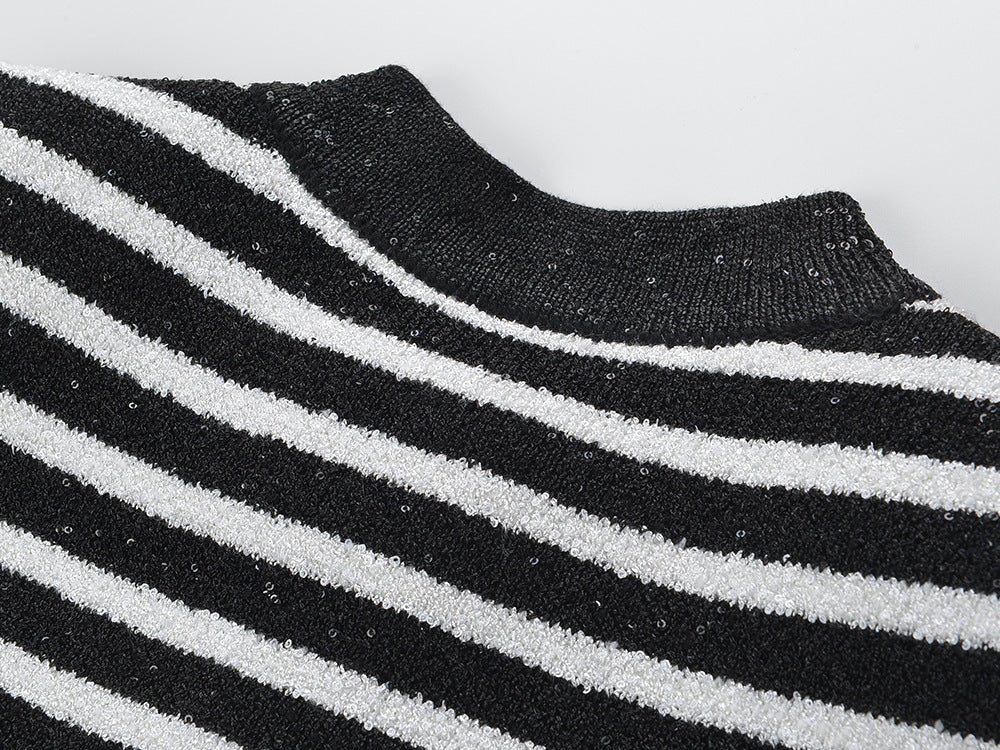 Black and white striped fitted knit cardigan with gold-tone buttons and front pockets