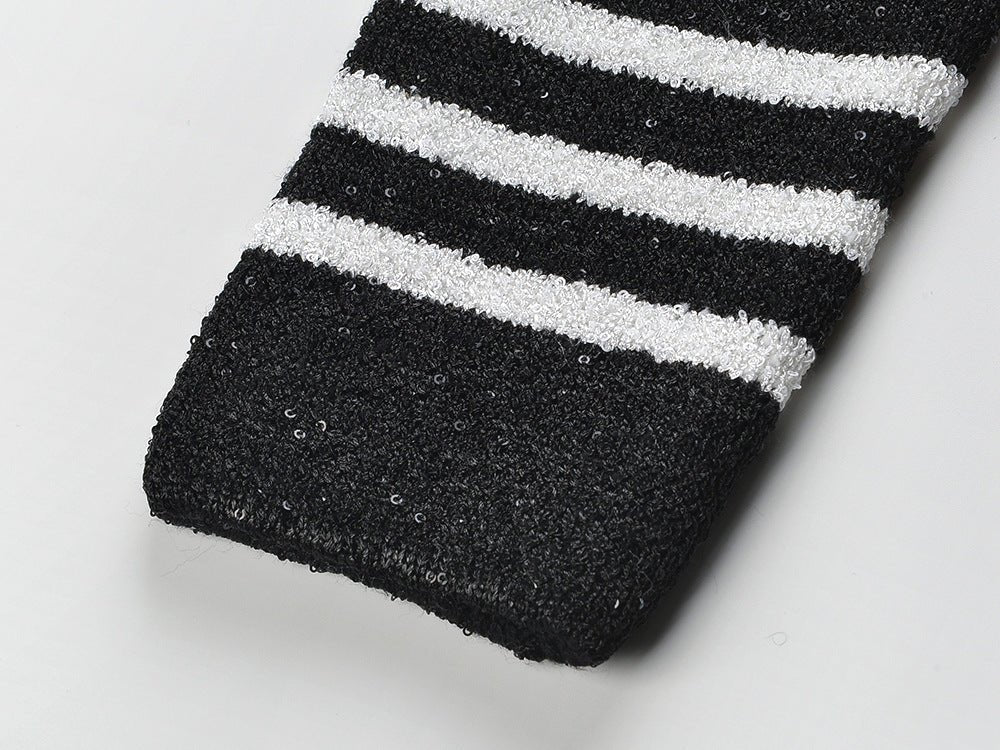 Black and white striped knit blazer with gold-tone buttons