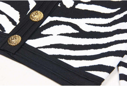 Black and white zebra print cropped cardigan with gold buttons