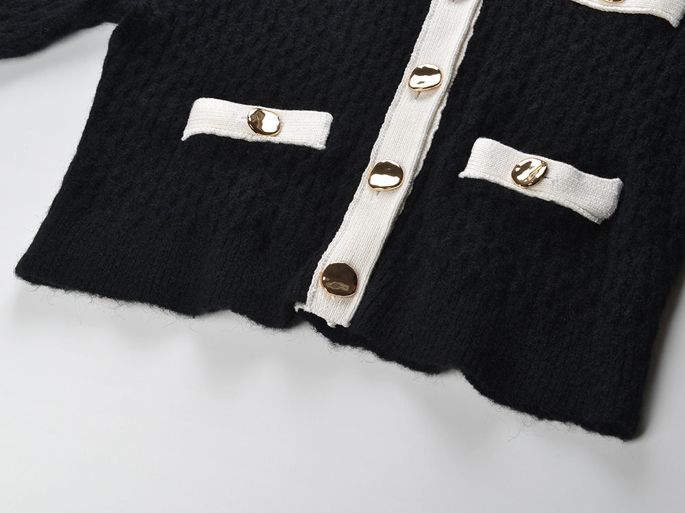 Sophia black ribbed knitted jacket with white accents and gold buttons paired with a matching bodycon skirt