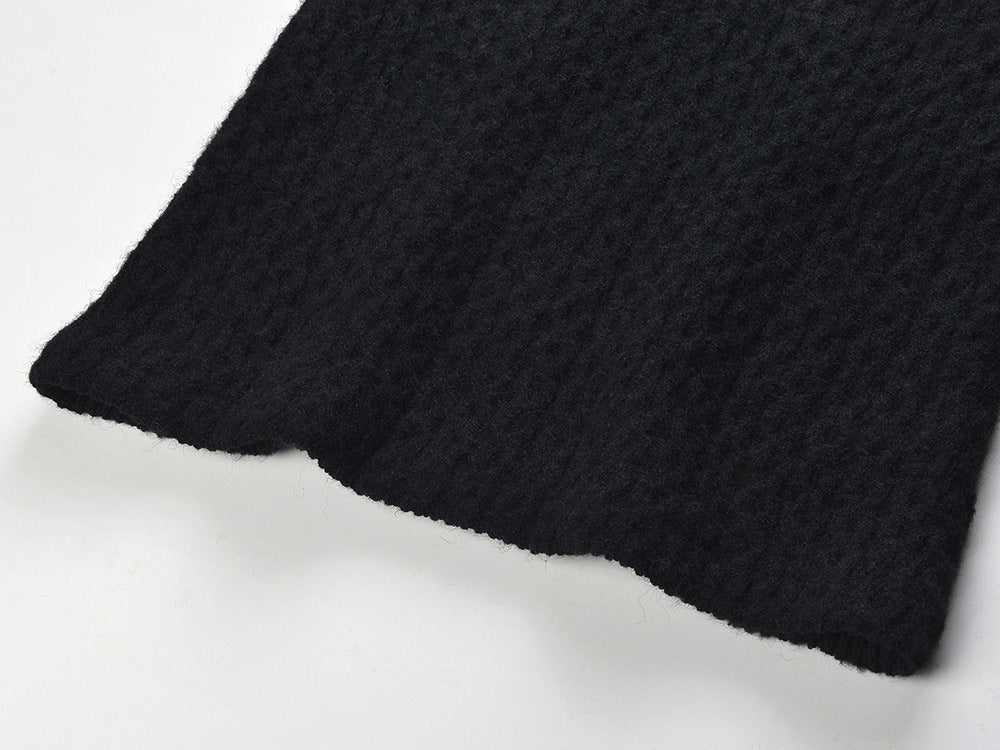 Sophia black ribbed knitted jacket with white accents and gold buttons paired with a matching bodycon skirt