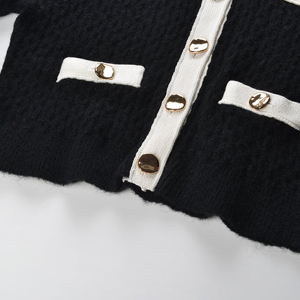 Sophia black ribbed knitted jacket with white accents and gold buttons paired with a matching bodycon skirt