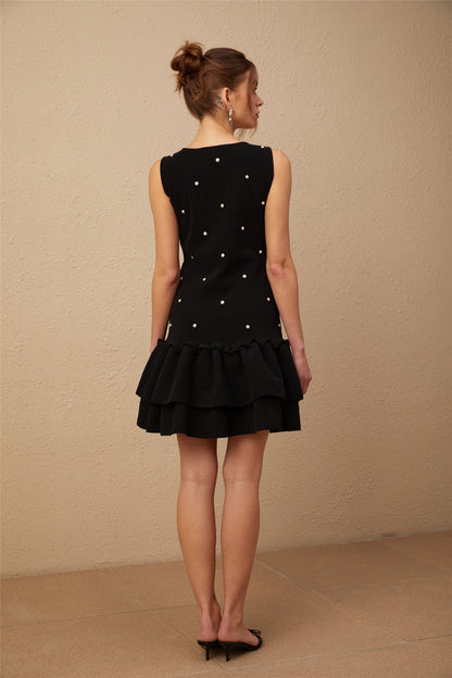 Blanche black knitted mini dress with bead embellishments