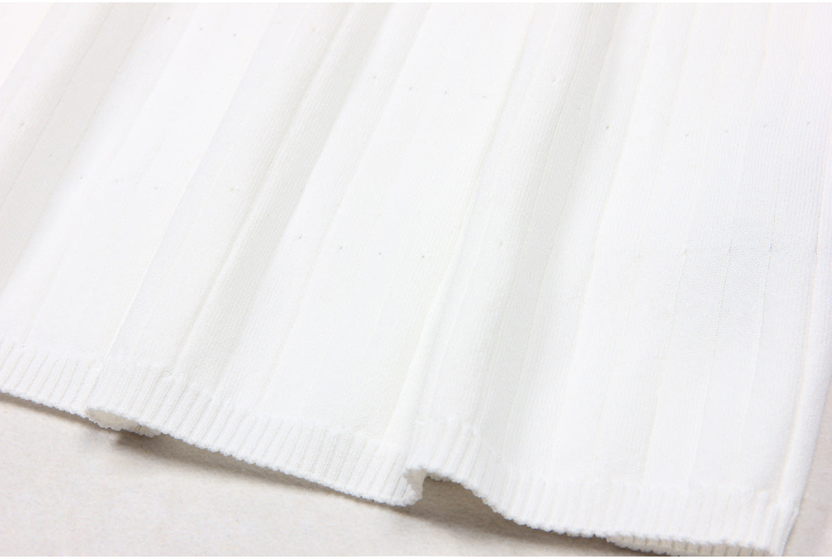 Blue accent white maxi dress with ribbed texture and pockets, form-fitting silhouette