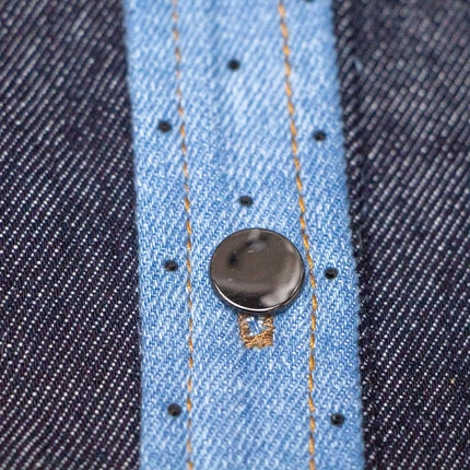 Blue denim jacket with contrast design and lapel collar worn by Emily
