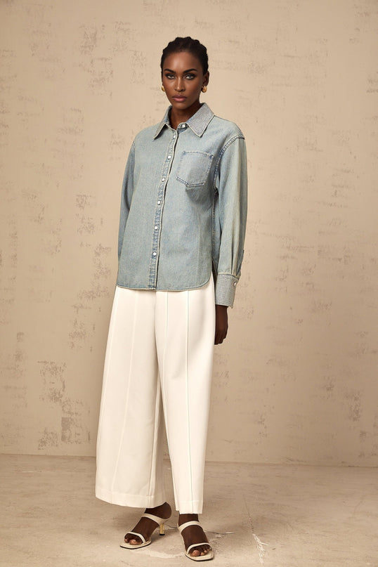 Blue denim shirt with rhinestone embellishments called Flavie